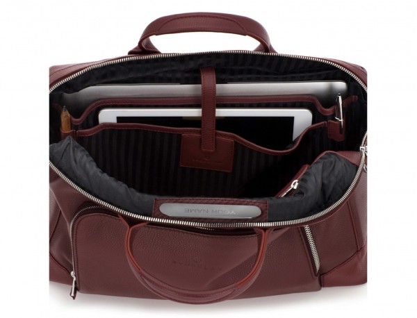 Leather briefbag in burgundy laptop compartment