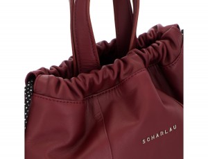 leather flat backpack in burgundy clasp