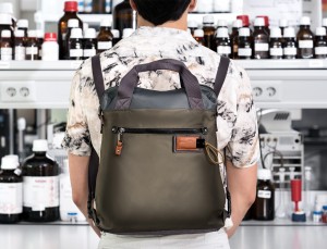 Bag convertible into backpack in black and gray lifestyle