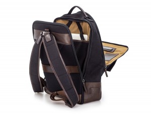 backpack in canvas and leather in black laptop compartment