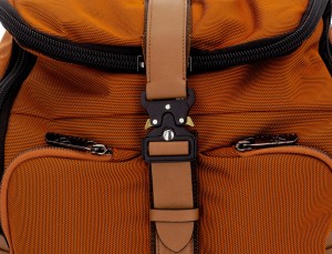 Travel backpack with flap in orange detail leather