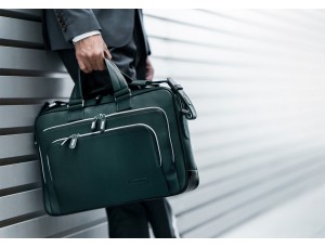 leather business bag in green lifestyle