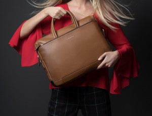 leather briefbag in black woman